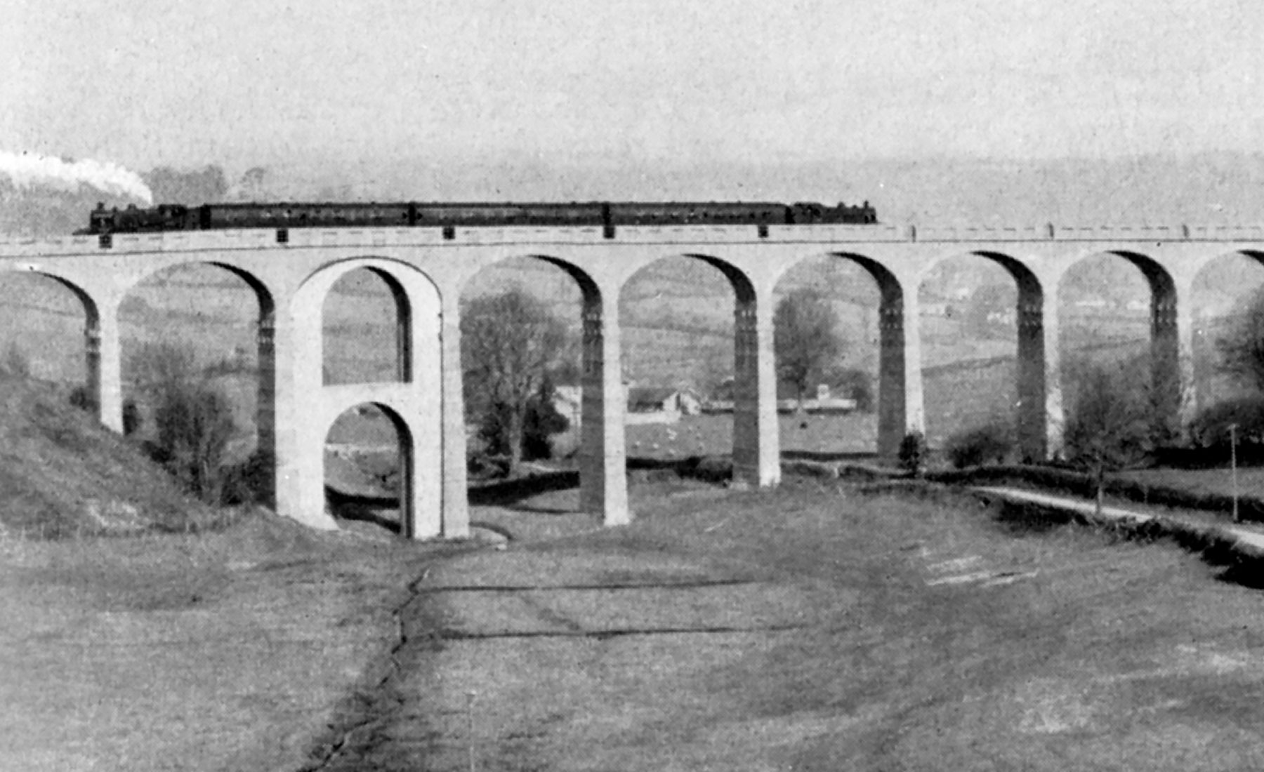 Pacific No 35022 crossing Carrington Viaduct 7th March 1965